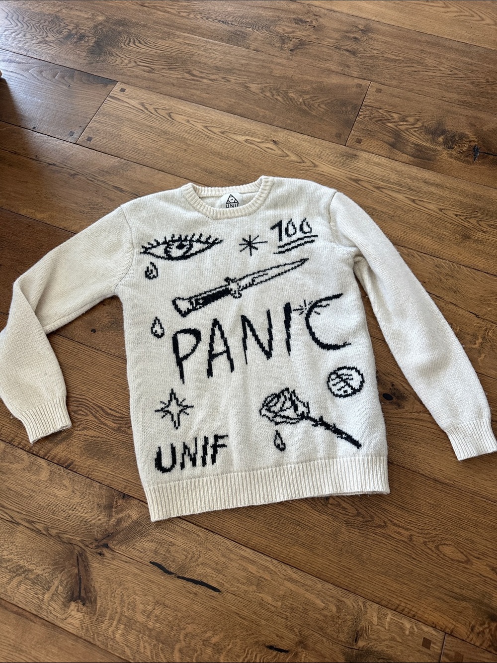 UNIF Cream Crewneck Sweater with Black Graphic Motifs